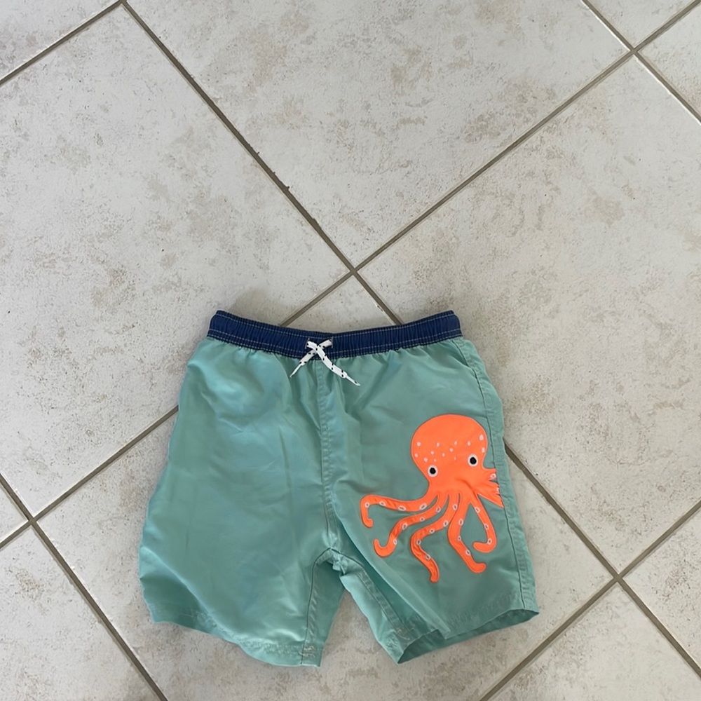 Mini Boden green swim trunks